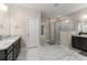 Bathroom with double vanity, granite countertops, a glass shower, and marble floors at 380 Parkside Meadow Sw Dr, Marietta, GA 30064