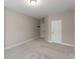 Neutral bedroom featuring a closet and additional interior doors, with natural light from a ceiling fixture at 380 Parkside Meadow Sw Dr, Marietta, GA 30064