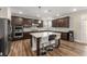 Modern kitchen with granite countertops, stainless steel appliances, and large island with seating at 380 Parkside Meadow Sw Dr, Marietta, GA 30064