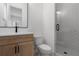 Bathroom with a wooden vanity and a glass-enclosed shower at 3909 Enclave Way, Tucker, GA 30084