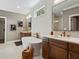 Luxurious bathroom featuring dual vanities, a standalone tub, and modern fixtures at 3909 Enclave Way, Tucker, GA 30084