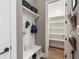 Convenient mudroom features a built-in bench, storage shelves, and an adjacent pantry for easy organization at 3909 Enclave Way, Tucker, GA 30084