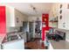 Galley kitchen featuring white cabinets, stainless steel appliances, and hardwood floors at 4283 Northwind Dr, Ellenwood, GA 30294