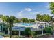 Community pool featuring lounge chairs and pergola offers a relaxing outdoor space at 445 Edenbrooke Way, Roswell, GA 30075