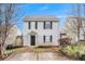 Charming two-story home featuring a welcoming entrance and well-maintained landscaping in a cozy neighborhood at 256 Coral Cir, Mcdonough, GA 30253