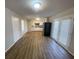 Open dining room featuring wood-look flooring and lots of natural light at 2827 Vicksburg Ct, Decatur, GA 30034