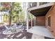 Picturesque backyard with an outdoor lounge area, under a porch at 765 Glengate Pl, Atlanta, GA 30328