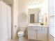 Bright bathroom showcasing a vanity, tile floors, and a shower-tub combination at 765 Glengate Pl, Atlanta, GA 30328