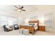 Spacious bedroom with a ceiling fan, tray ceiling, and lots of natural light at 765 Glengate Pl, Atlanta, GA 30328