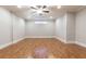 Spacious bonus room with hardwood floors, recessed lighting, and neutral paint at 765 Glengate Pl, Atlanta, GA 30328