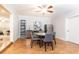 Bonus room with a dining table, refrigerator, and mirrored gym at 765 Glengate Pl, Atlanta, GA 30328