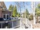 Large deck featuring outdoor furniture and beautiful tree views at 765 Glengate Pl, Atlanta, GA 30328