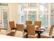 Bright dining room with modern chandelier and large windows offering plenty of natural light at 765 Glengate Pl, Atlanta, GA 30328