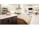 Gourmet kitchen with stainless steel appliances, gas range, island, and open floorplan at 765 Glengate Pl, Atlanta, GA 30328