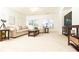 Spacious living room featuring neutral decor, comfortable seating, and ample natural light, creating a serene and inviting space at 765 Glengate Pl, Atlanta, GA 30328
