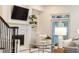 Bright living room features a fireplace, built-in shelves, and a large window at 765 Glengate Pl, Atlanta, GA 30328