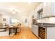 The living room features wood floors, a small bar with a wine cooler, and neutral decor at 765 Glengate Pl, Atlanta, GA 30328