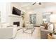 Bright and airy living room featuring a fireplace, built-in shelving, and neutral decor at 765 Glengate Pl, Atlanta, GA 30328