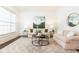 Cozy living room featuring plush seating, stylish decor, and an area rug at 765 Glengate Pl, Atlanta, GA 30328
