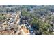 This aerial shot shows the home nestled within a lush, wooded community at 857 Winding Trl, Lawrenceville, GA 30046
