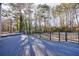 A large deck extends from the home into the yard, perfect for entertaining at 857 Winding Trl, Lawrenceville, GA 30046