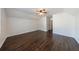 Spacious bedroom features hardwood floors and a ceiling fan at 857 Winding Trl, Lawrenceville, GA 30046