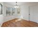 Bright breakfast nook featuring hardwood floors, natural light from windows, and white trim at 857 Winding Trl, Lawrenceville, GA 30046