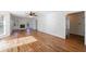 Bright and open living area with hardwood floors and a fireplace at 857 Winding Trl, Lawrenceville, GA 30046