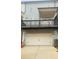 Rear view featuring a large, two car garage and balcony at 161 Jameson Dr, Acworth, GA 30102