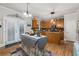 Bright kitchen with wooden cabinets, stainless steel appliances, and adjacent outdoor access at 5211 Centennial Hill Nw Dr, Acworth, GA 30102
