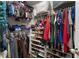 Walk-in closet featuring ample shelving and hanging space for organized storage at 5211 Centennial Hill Nw Dr, Acworth, GA 30102