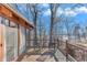 A cozy balcony offering views of the serene lake, furnished with comfortable chairs for relaxing at 7875 Robin Rd, Cumming, GA 30041