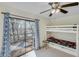 Cozy bedroom features a bunk bed and access to a private deck with scenic views at 7875 Robin Rd, Cumming, GA 30041