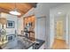 Cozy kitchen boasts a black granite countertop and stainless steel appliances at 7875 Robin Rd, Cumming, GA 30041