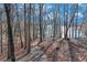 Gravel walking path leading through the wood and to the lake at 7875 Robin Rd, Cumming, GA 30041