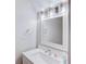 Bathroom with modern vanity, brushed-nickel faucet, framed mirror, and overhead lighting at 2340 Beaver Ruin Rd # Un62, Norcross, GA 30071