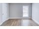 Empty bedroom with wood floors and a neutral paint at 2340 Beaver Ruin Rd # Un62, Norcross, GA 30071