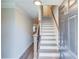Inviting entryway with staircase and gray wood flooring leading into the home at 2340 Beaver Ruin Rd # Un62, Norcross, GA 30071