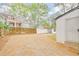 Large backyard featuring a detached garage and ample space for outdoor activities at 2769 Glenwood Se Ave, Atlanta, GA 30317