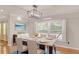 Charming dining room featuring stylish light fixture, neutral paint, and plenty of natural light at 2769 Glenwood Se Ave, Atlanta, GA 30317