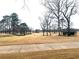 Expansive view of the golf course, showcasing lush greens and a convenient shelter for players at 2769 Glenwood Se Ave, Atlanta, GA 30317