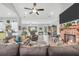 Cozy living area with fireplace, recessed lighting, and open access to kitchen at 3911 Peeksville Rd, Locust Grove, GA 30248