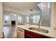 Open kitchen view to living room fireplace and staircase at 3769 Baxley Point Dr, Suwanee, GA 30024