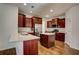 Modern kitchen features stainless steel appliances and granite countertops at 3769 Baxley Point Dr, Suwanee, GA 30024