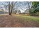 Backyard view of the lot and wooden fencing at 112 Oakland Blvd, Stockbridge, GA 30281