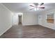 Inviting living room with neutral walls and sleek, updated flooring, ideal for comfortable living at 112 Oakland Blvd, Stockbridge, GA 30281