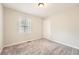 Comfortable bedroom with neutral tones, plush carpet, and closet at 2102 Red Berry Sw Ln, Marietta, GA 30008
