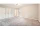Neutral bedroom with plush carpeting, large closet, and plenty of natural light at 2102 Red Berry Sw Ln, Marietta, GA 30008