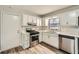 Charming kitchen featuring stainless steel appliances, stylish countertops, and ample cabinet space at 2102 Red Berry Sw Ln, Marietta, GA 30008