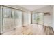 The living room has hardwood floors and sliding doors that offer plenty of natural light at 2102 Red Berry Sw Ln, Marietta, GA 30008